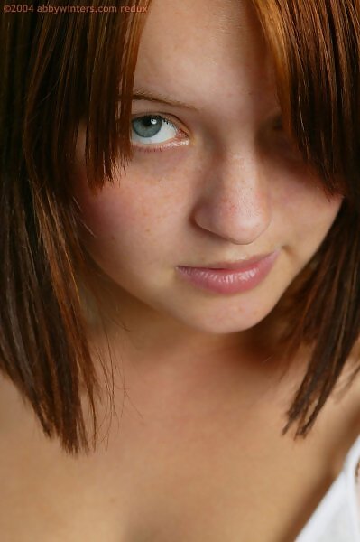 Elizabeth stripping in the living room from abbywinters.com - 5/16