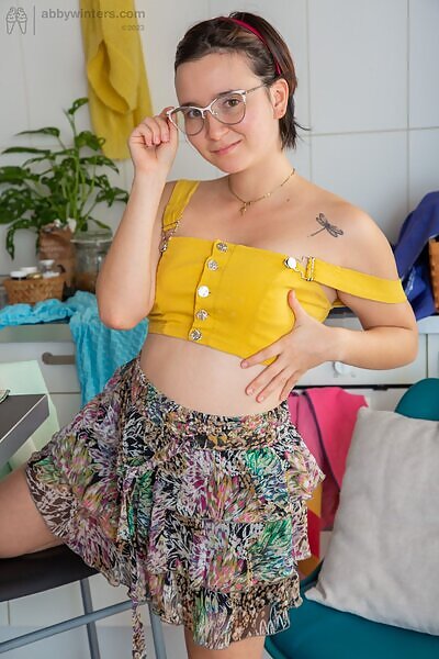 Lissa W in yellow top and short skirt from abbywinters.com - 1/16