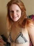 Lovely redhead amateur stripping