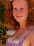Freckled redhead hottie with big tits rubbing her pussy