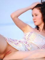 Sexy teen Adriana showing off her shaved pussy