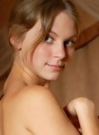 Cute blonde teen Camille showing off her big puffy nipples