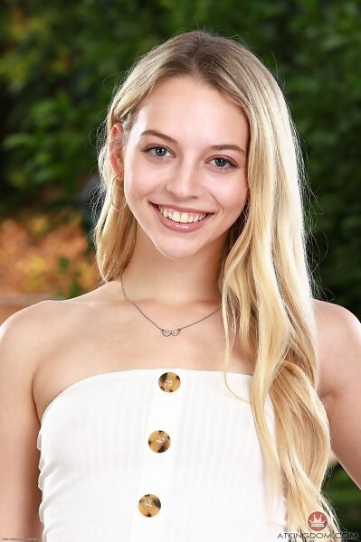 Lily Larimar in jeans and a white tube top from ATK Galleria - 2/20