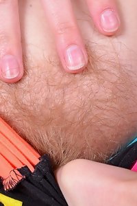 Hairy redhead spreads her gaping asshole