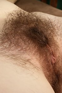 Brunette amateur reveals her hairy ass crack