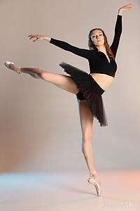 Slender Ballerina shows how flexible she is