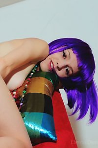 Skinny purple-haired girl spreads her shaved pussy