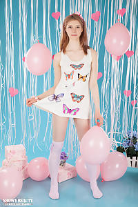 Cute redhead teen nude with balloons