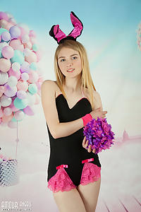 Flat-chested blonde teen dressed as a bunny