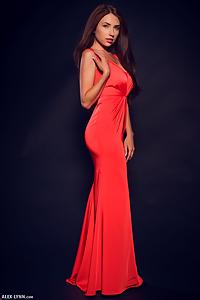 Busty brunette takes off her red dress
