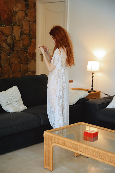 Redhead babe in a see-through night gown masturbating