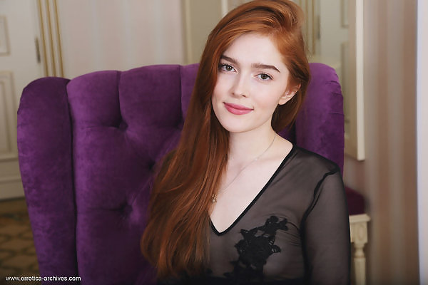 Sexy redhead Jia Lissa spreads her legs on a chair