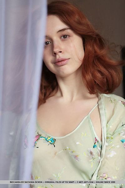 Redhead teen takes off her see-through night gown