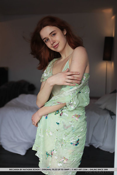 Redhead teen takes off her see-through night gown