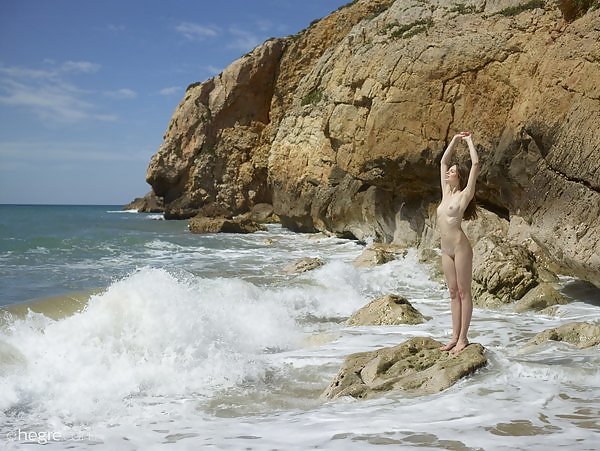 Sexy girl nude by the sea
