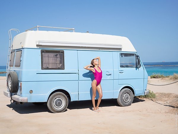 Tanned babe Katya Clover bares all by a camper van