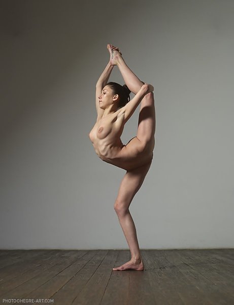 Brunette ballerina shows off how flexible she is