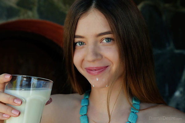 Blue-eyed teen Kay J getting messy with some milk