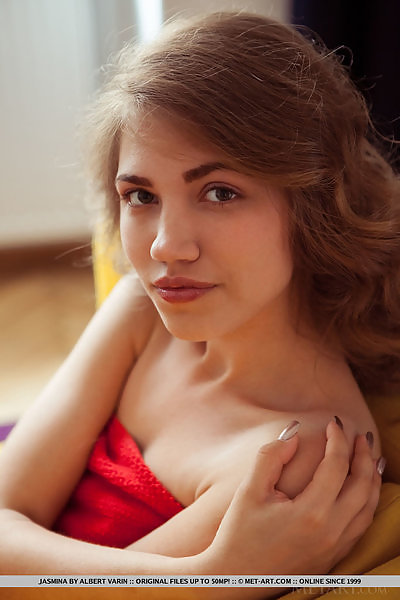 Flat-chested teen cutie spreading on a chair