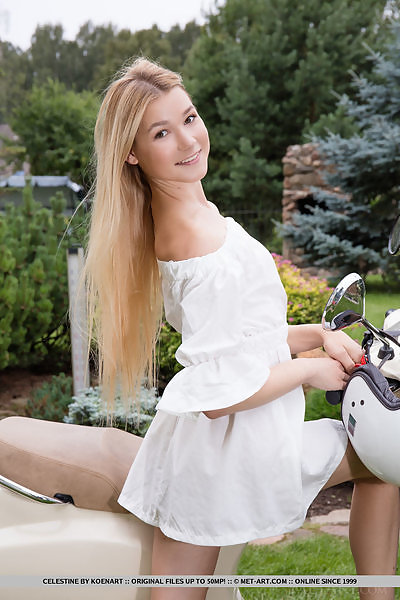 Cute blonde teen nude on a moped
