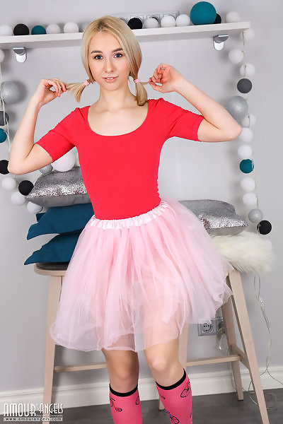 Blonde teen takes off her tutu and spreads her legs
