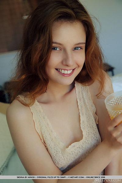 Redhead teen with puffy nipples spreading in bed
