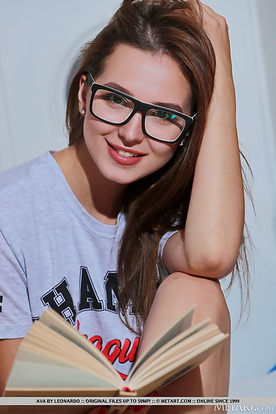 Nerdy brunette teen exposes her bald pussy