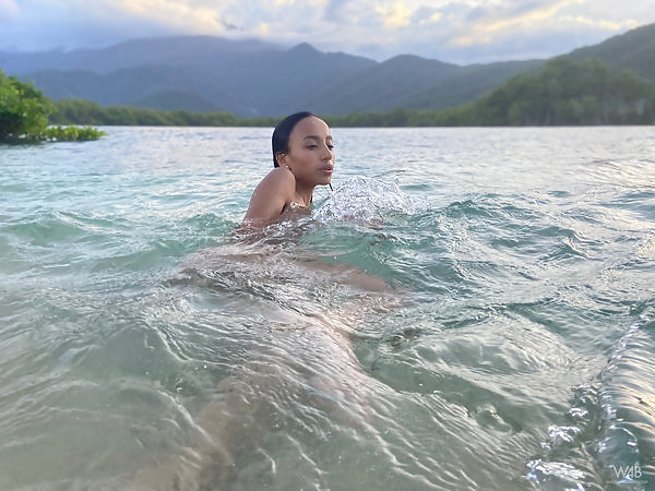Sexy Latina nude in the sea