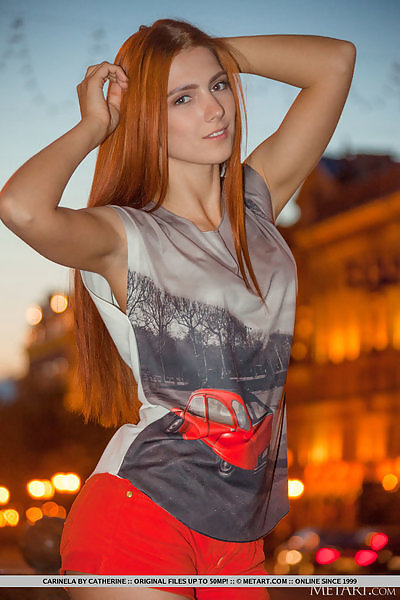 Flexible redhead posing nude