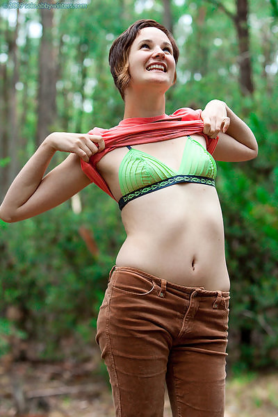Short-haired amateur shows off her bush in a forest