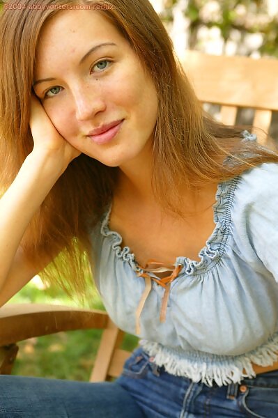 Natalia in a blue top and jeans from Abby Winters - 1/16