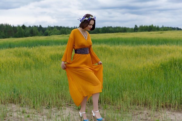 Diana in an orange dress - 1/15 Diana in an orange dress from Fame Girls - 1/15