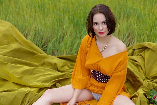 Diana in an orange dress - 7/15 Diana in an orange dress from Fame Girls - 7/15