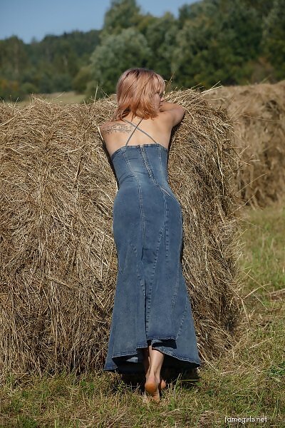 Diana lifts up her dress in a field - 2/20 Diana lifts up her dress in a field from Fame Girls - 2/20