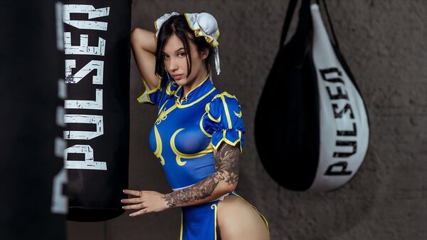 Cover featuring WINE in Looking For A Sparring from Suicide Girls