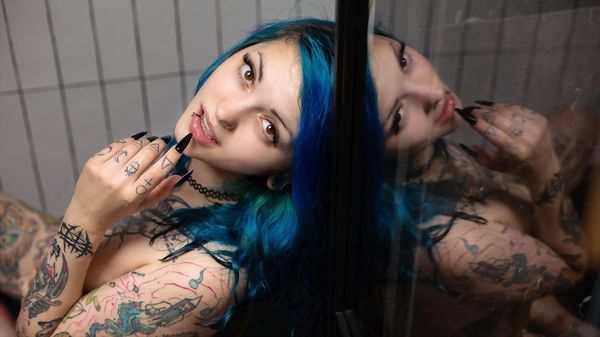 Cover featuring GLOOM in Agua De Rosas from Suicide Girls