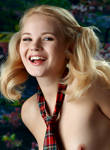 Gorgeous blonde schoolgirl stripping