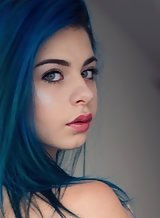 Flat-chested teen with blue hair and puffy nipples