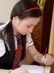 Adorable schoolgirl toying