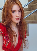 Stunning redhead Jia Lissa takes off her red dress