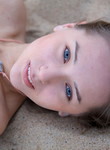 Adorable teen naked in sand dunes
