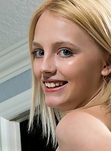 Cute blonde teen with blue eyes toying her tight bald pussy