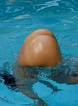 Gorgeous brunette swimming naked