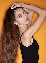 Skinny brunette teen Leona Mia spreads her ass