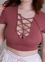 Hairy redhead amateur shows off her huge tits