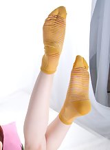 Cute redhead teen in yellow socks