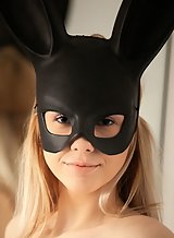 Masked blonde teen toying her shaved pussy