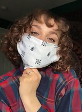 Cute quarantined girl with curly hair shows off her great ass