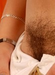 Hairy amateur teen toying unshaven snatch