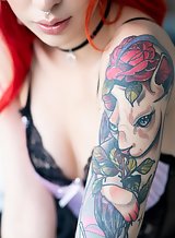 Tattooed suicide girl Drew teasing in lingerie and pigtails